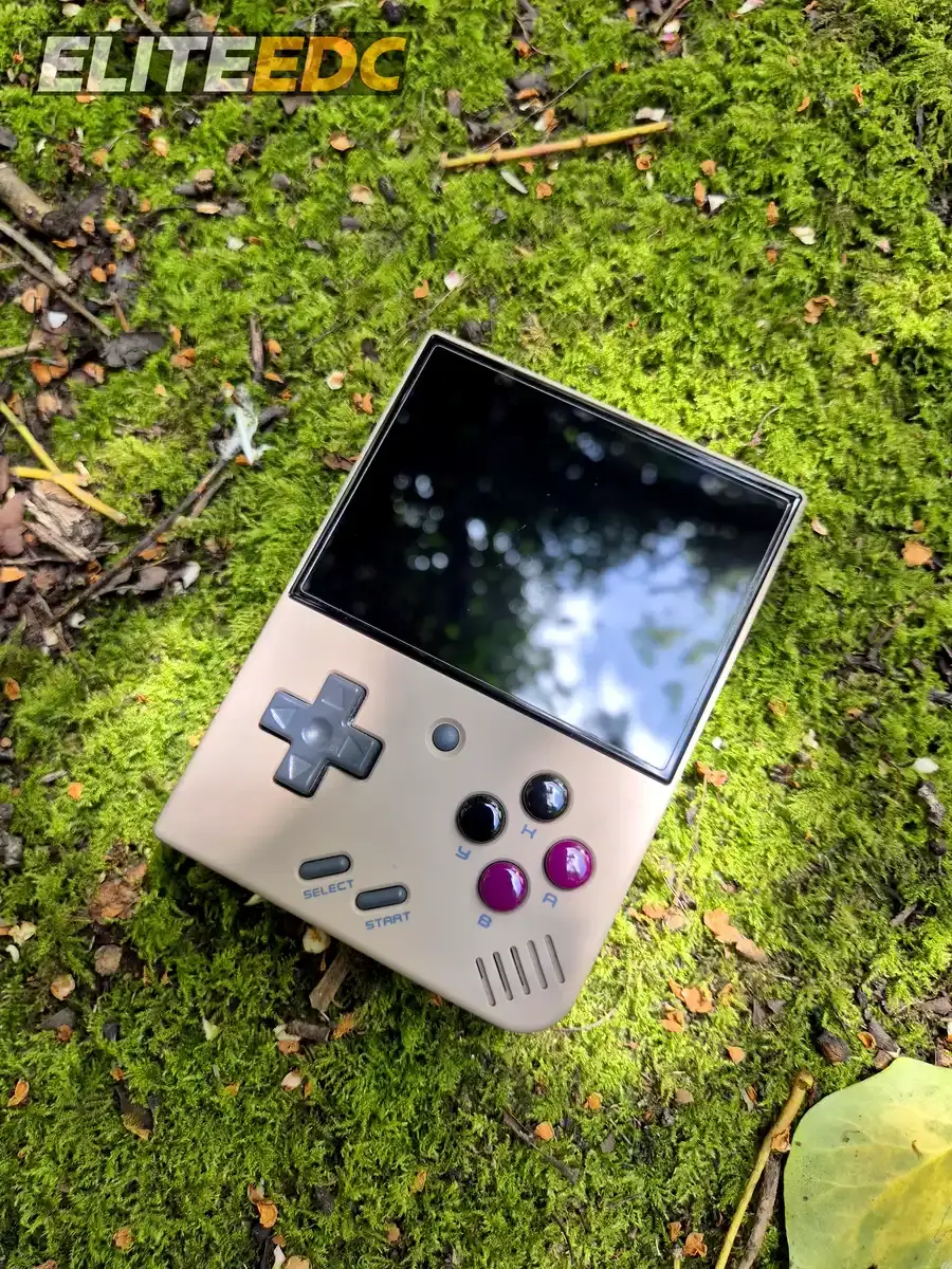 Miyoo Mini Plus front view, grey colourway with purple face buttons