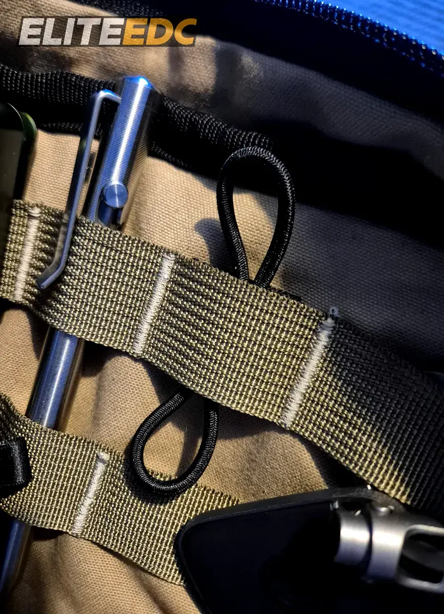NutSac Speed Sling elastic loop patch threaded through nylon MOLLE webbing
