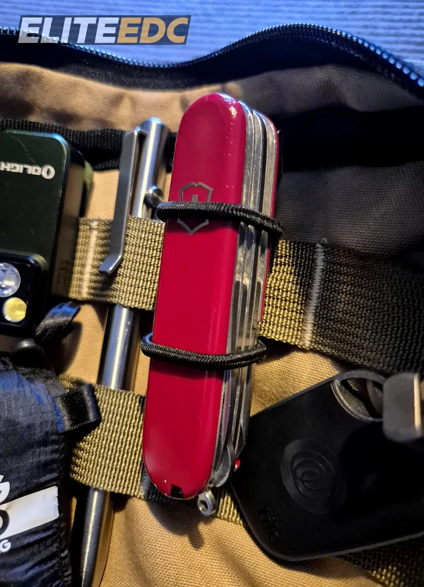 NutSac Speed Sling elastic loop patch holding a Victorinox Fieldmaster
