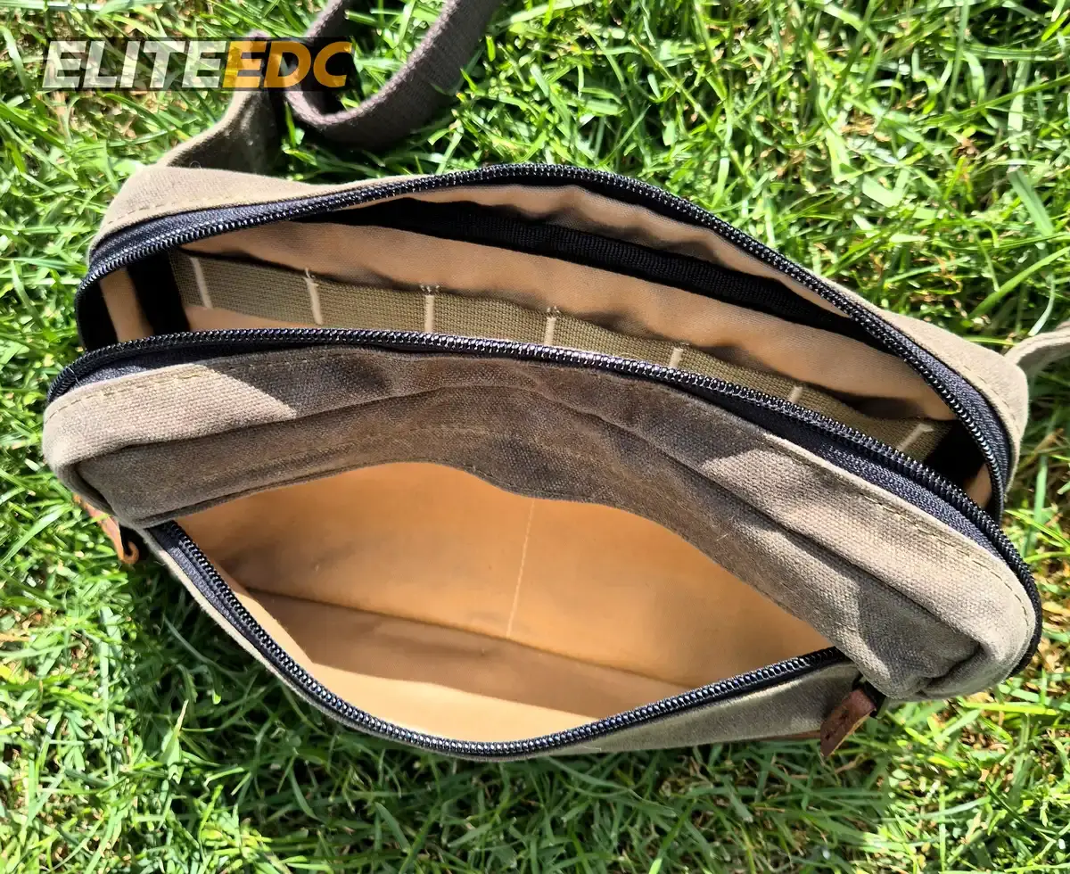 NutSac Speed Sling front zip pocket open and empty