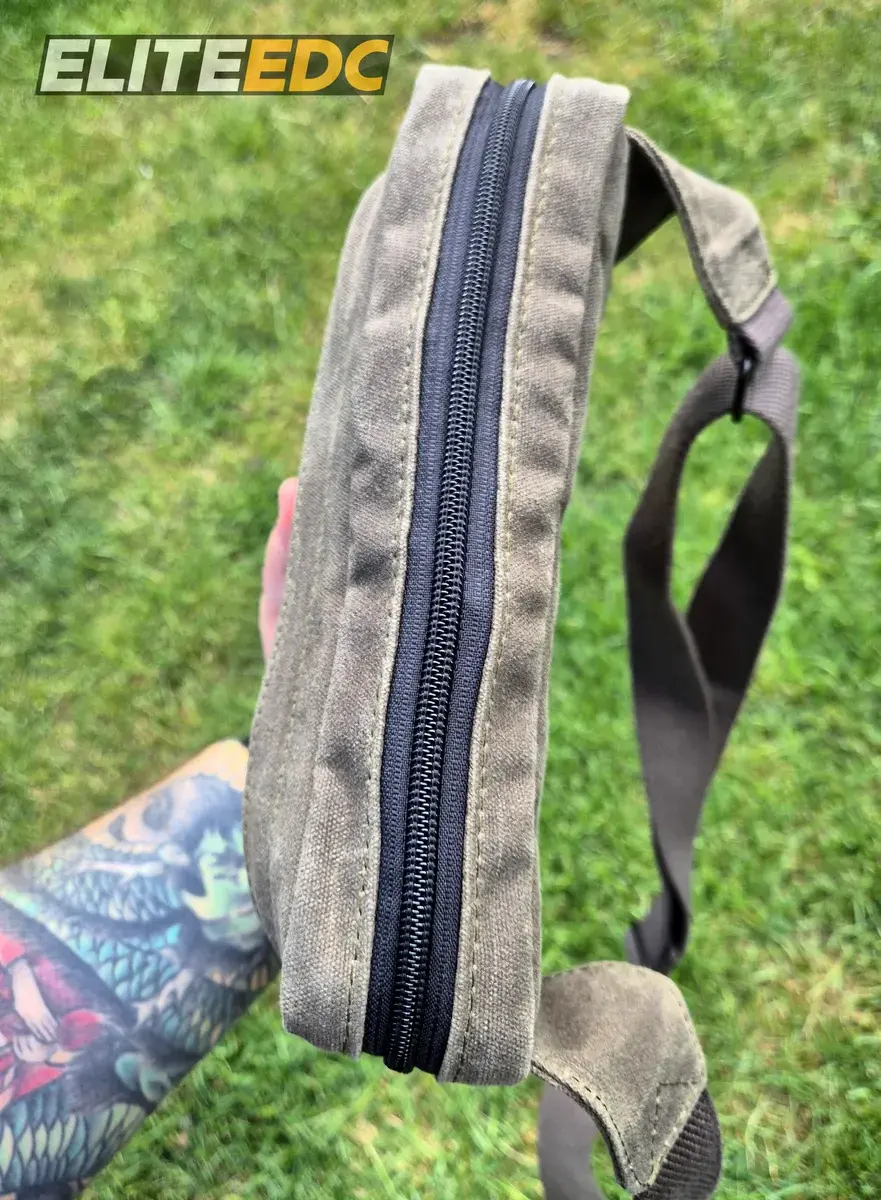 NutSac Speed Sling top-down view in hand