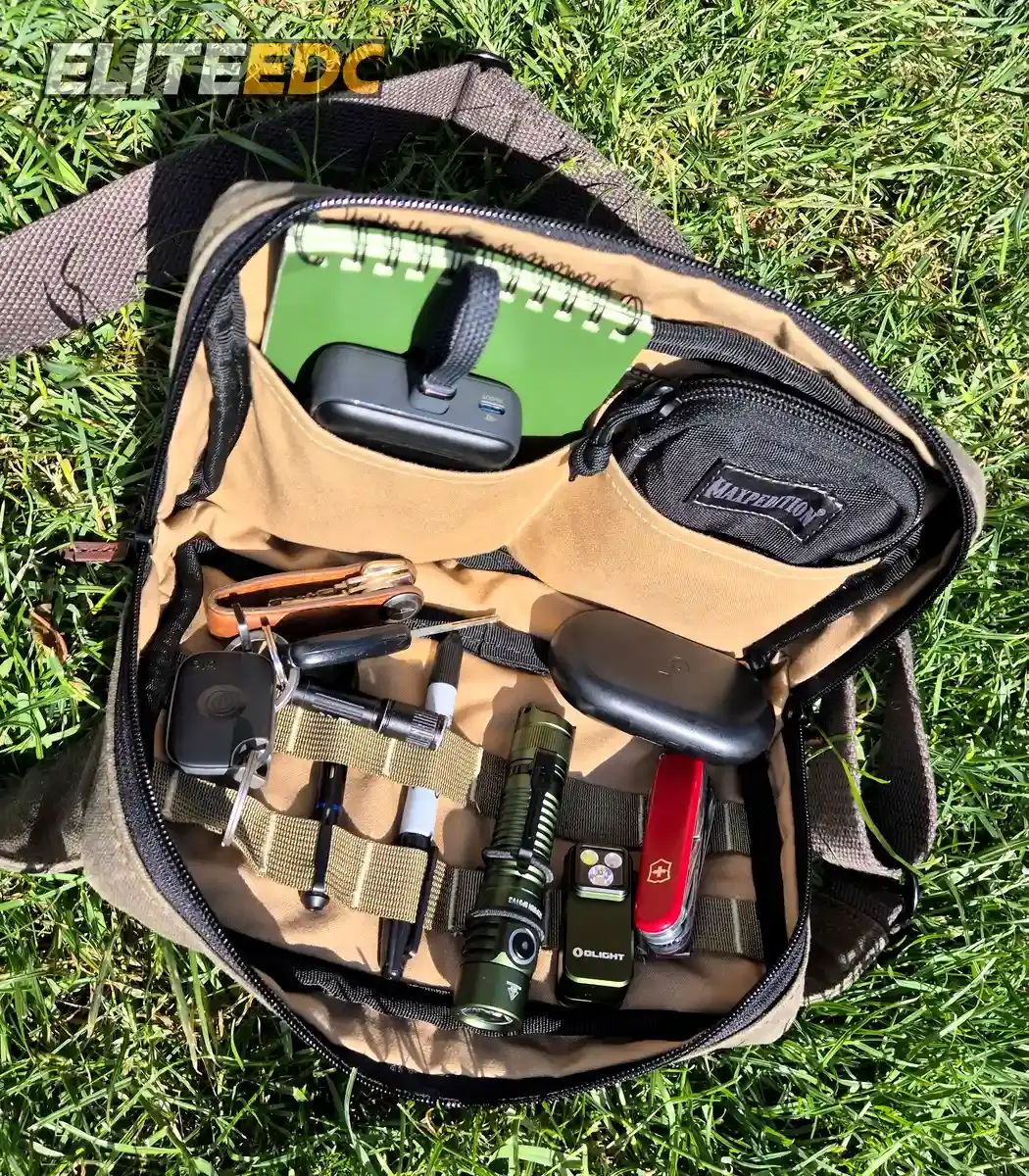 NutSac Speed Sling open with EDC loadout, flap pocket side