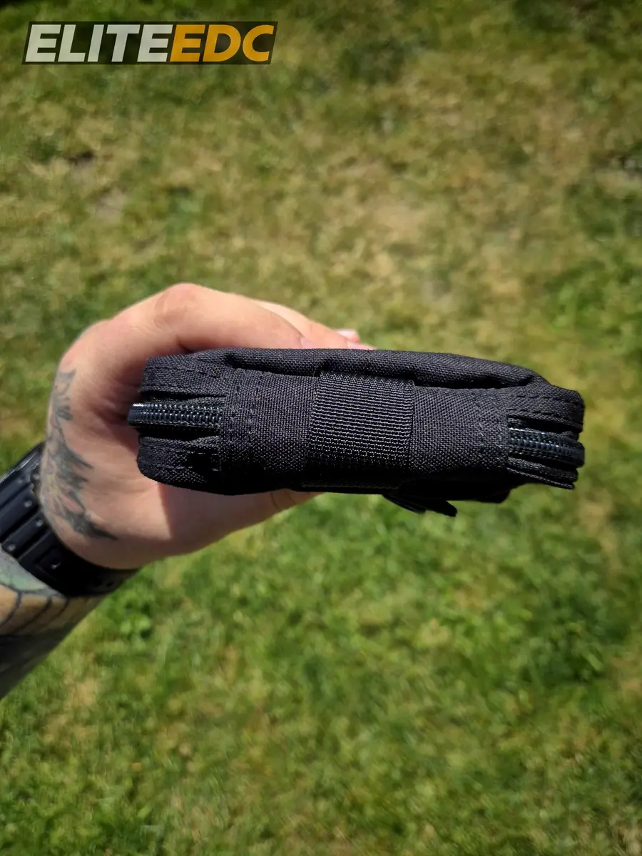 Excellent Elite Spanker MOLLE admin pouch profile view in hand
