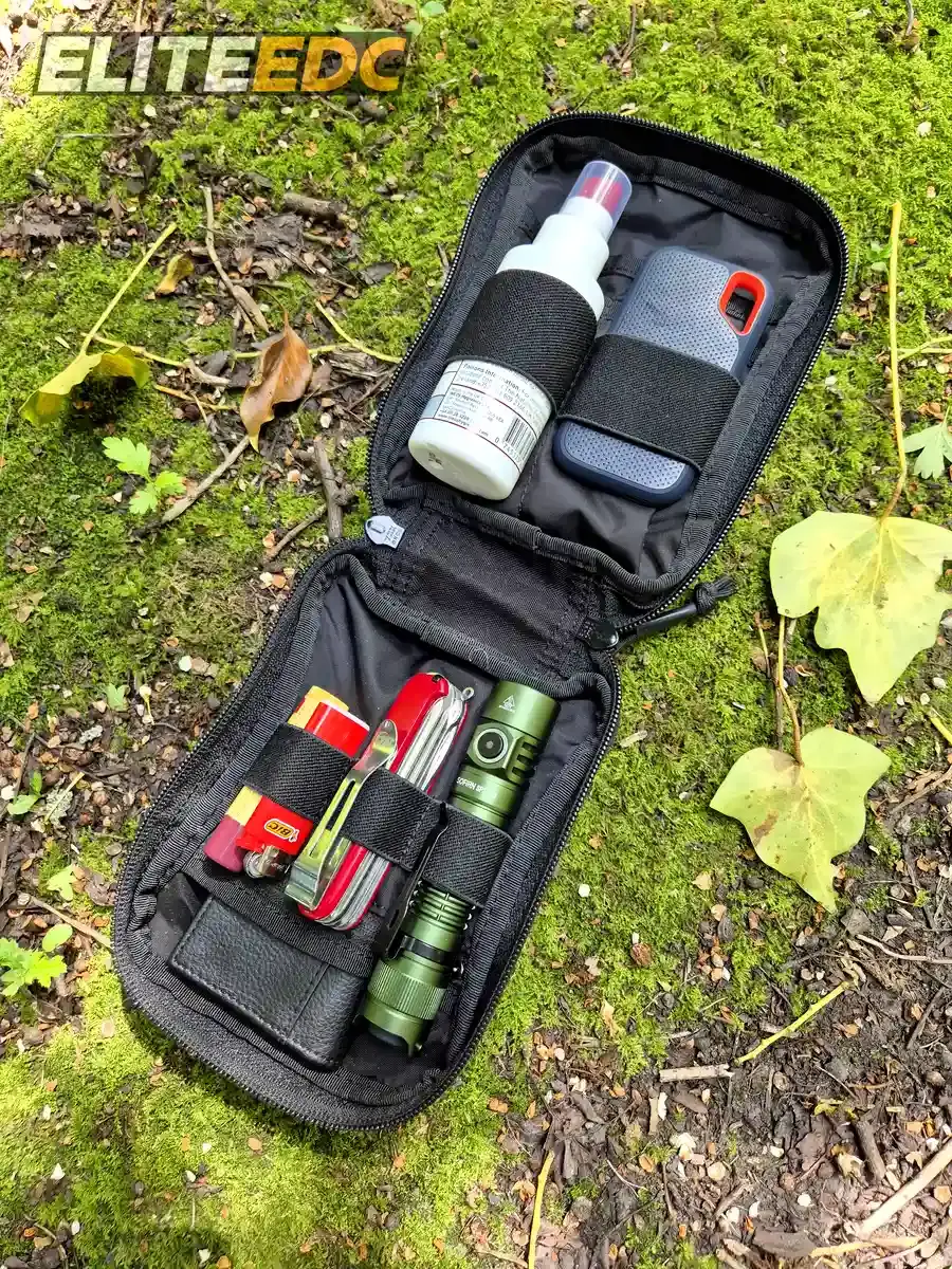 Excellent Elite Spanker MOLLE admin pouch open and filled with EDC gear